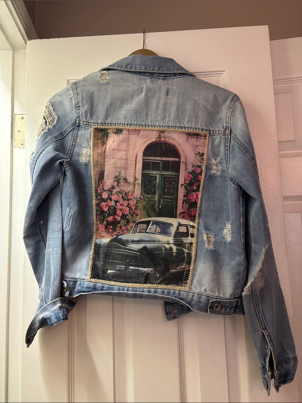 Vintage-Inspired Light Blue Denim Jacket with Scenic Back Patch